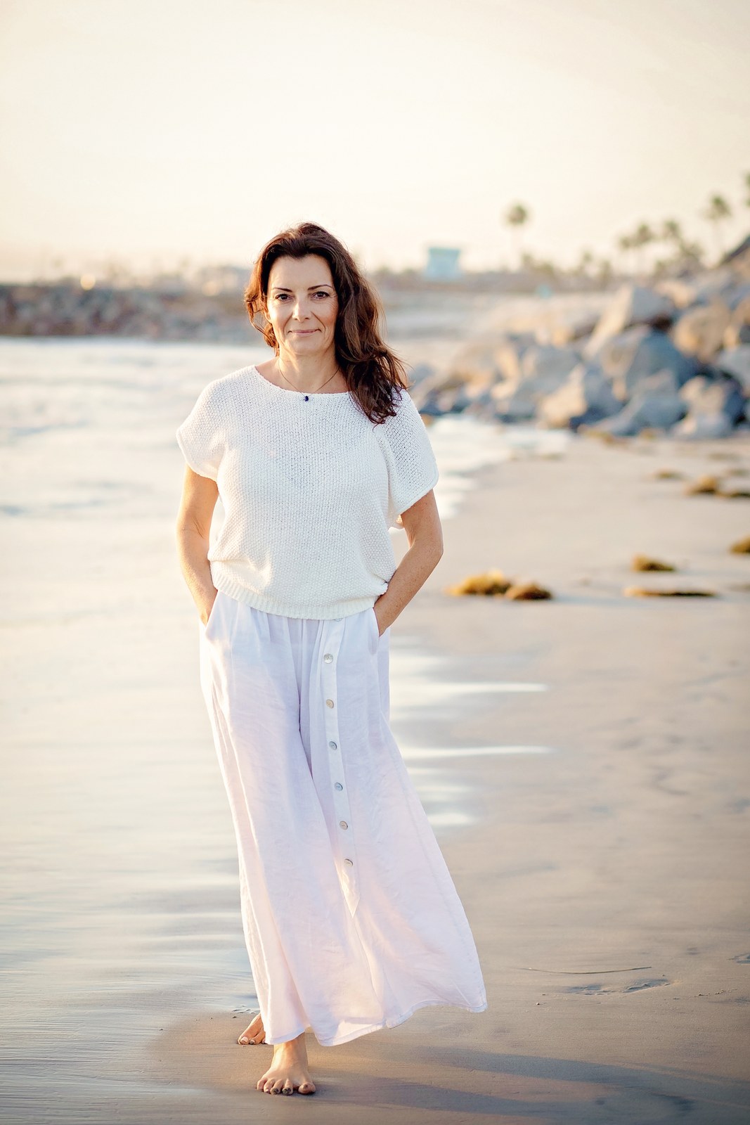 Nathalie Magnus walking on the beach